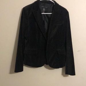Black velvet blazer. Size 8. It is too small for me. Great
